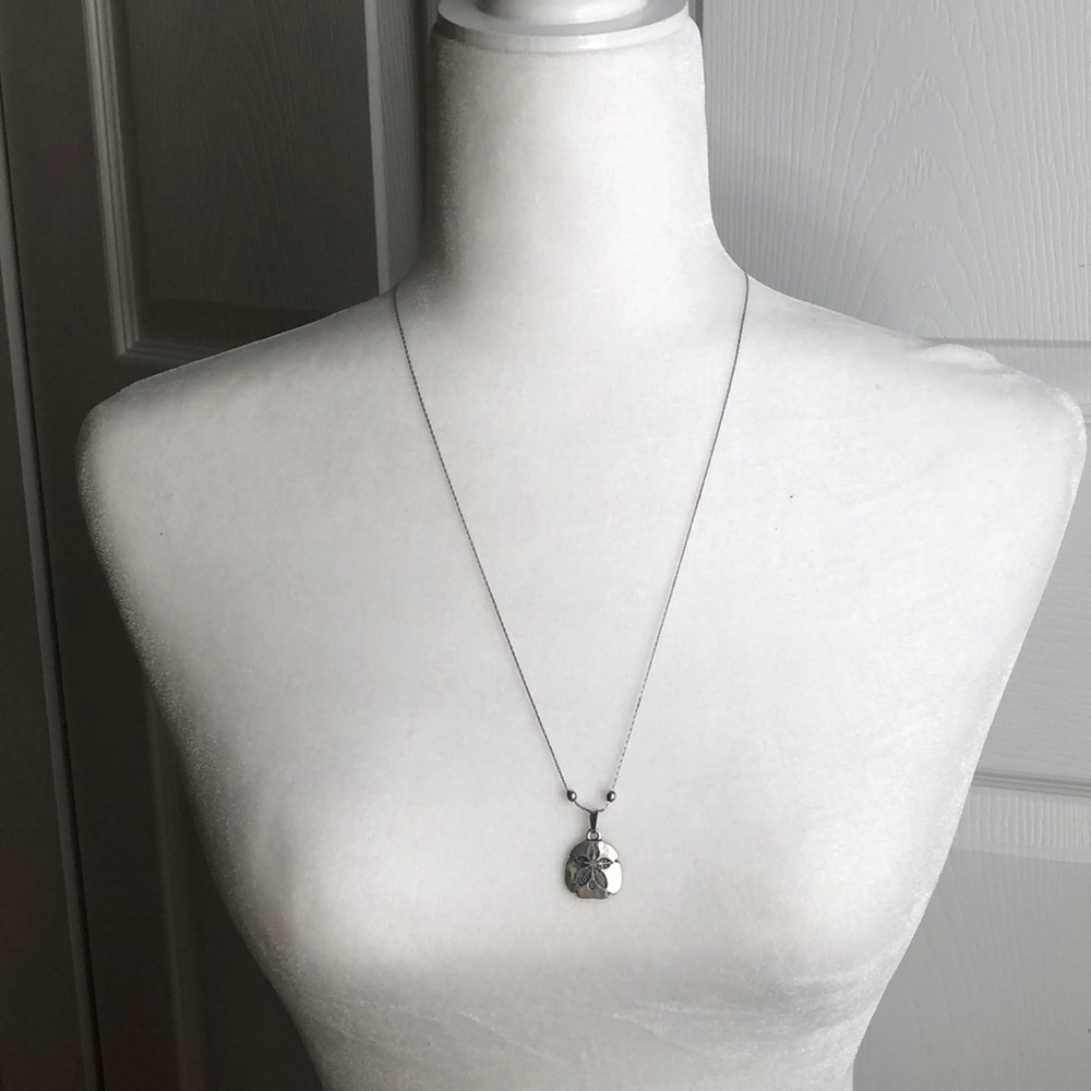 Alex & ani sand dollar necklace silver.